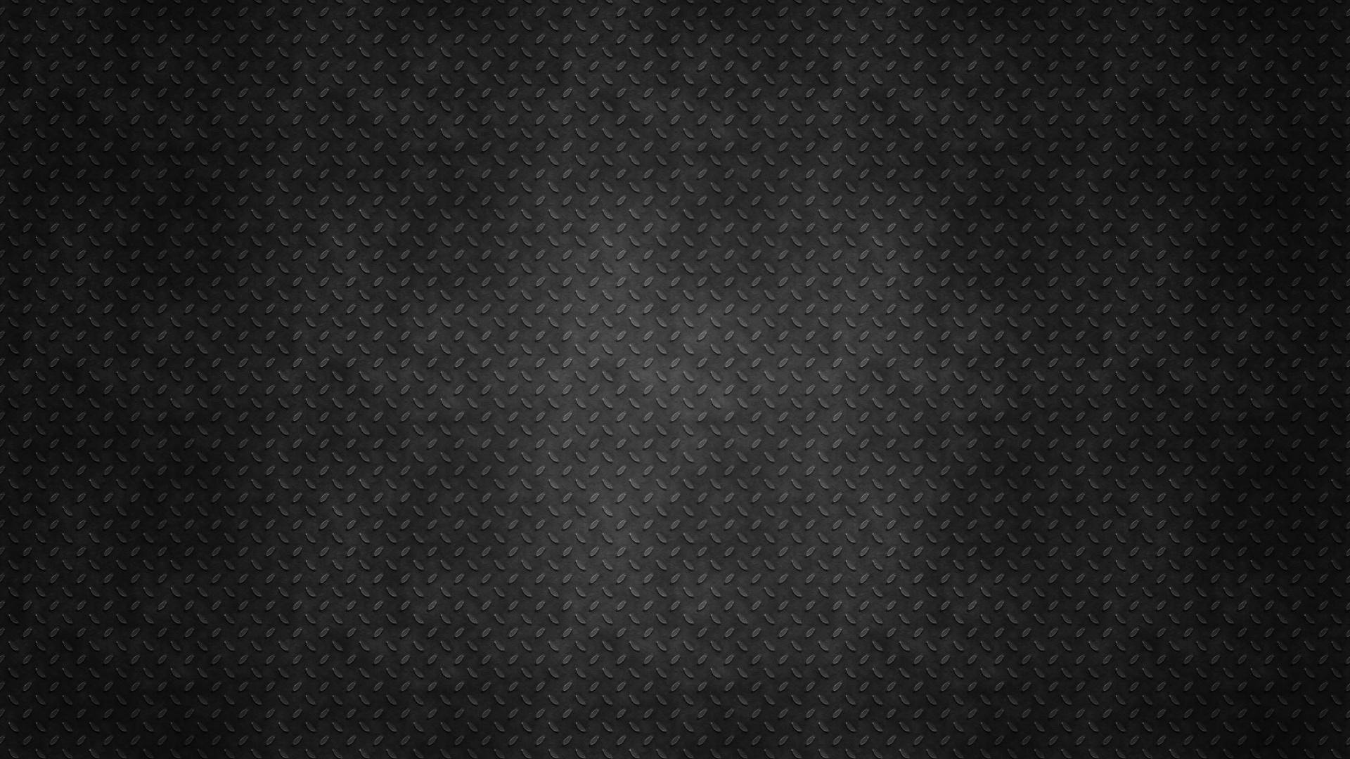 Textured Total Black Metallic Surface Background