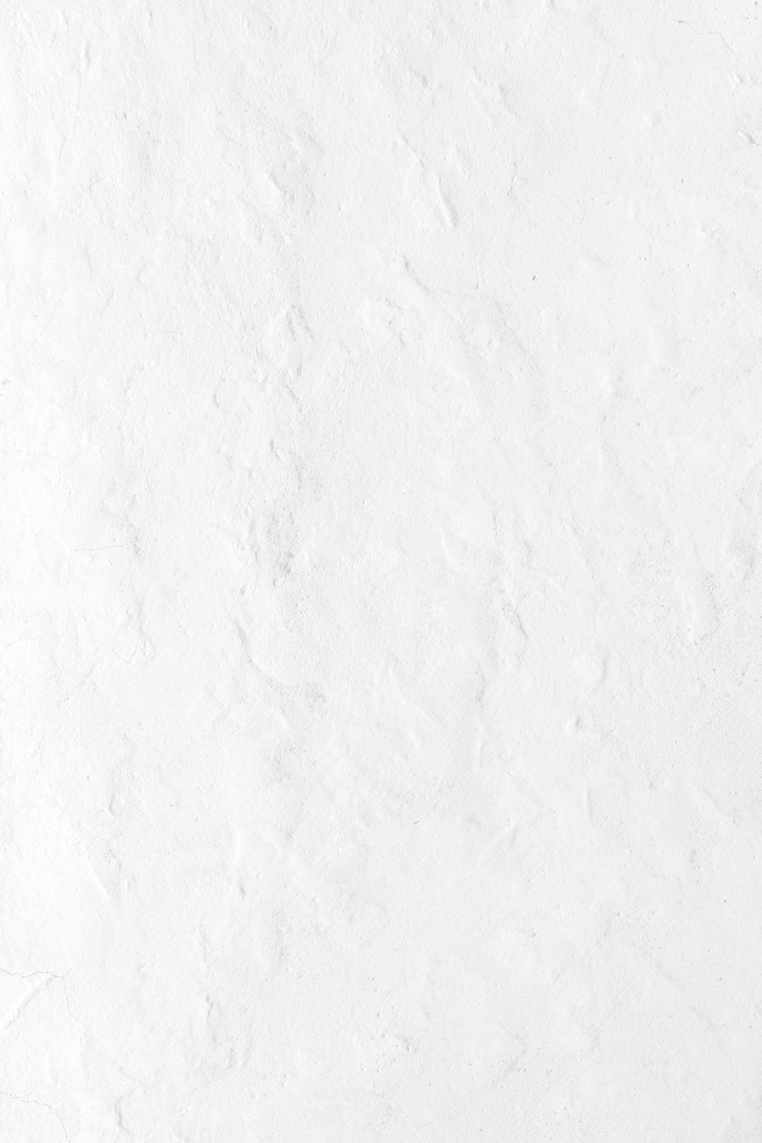 Textured White Color Paper Background