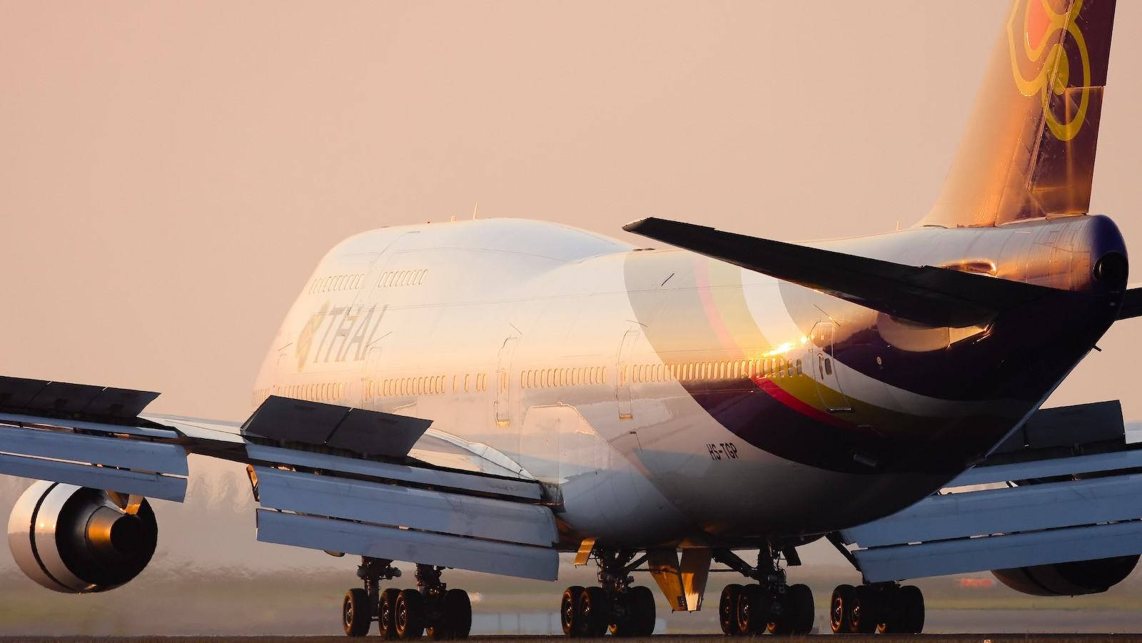 Thai Airways Jumbo Airplane Background