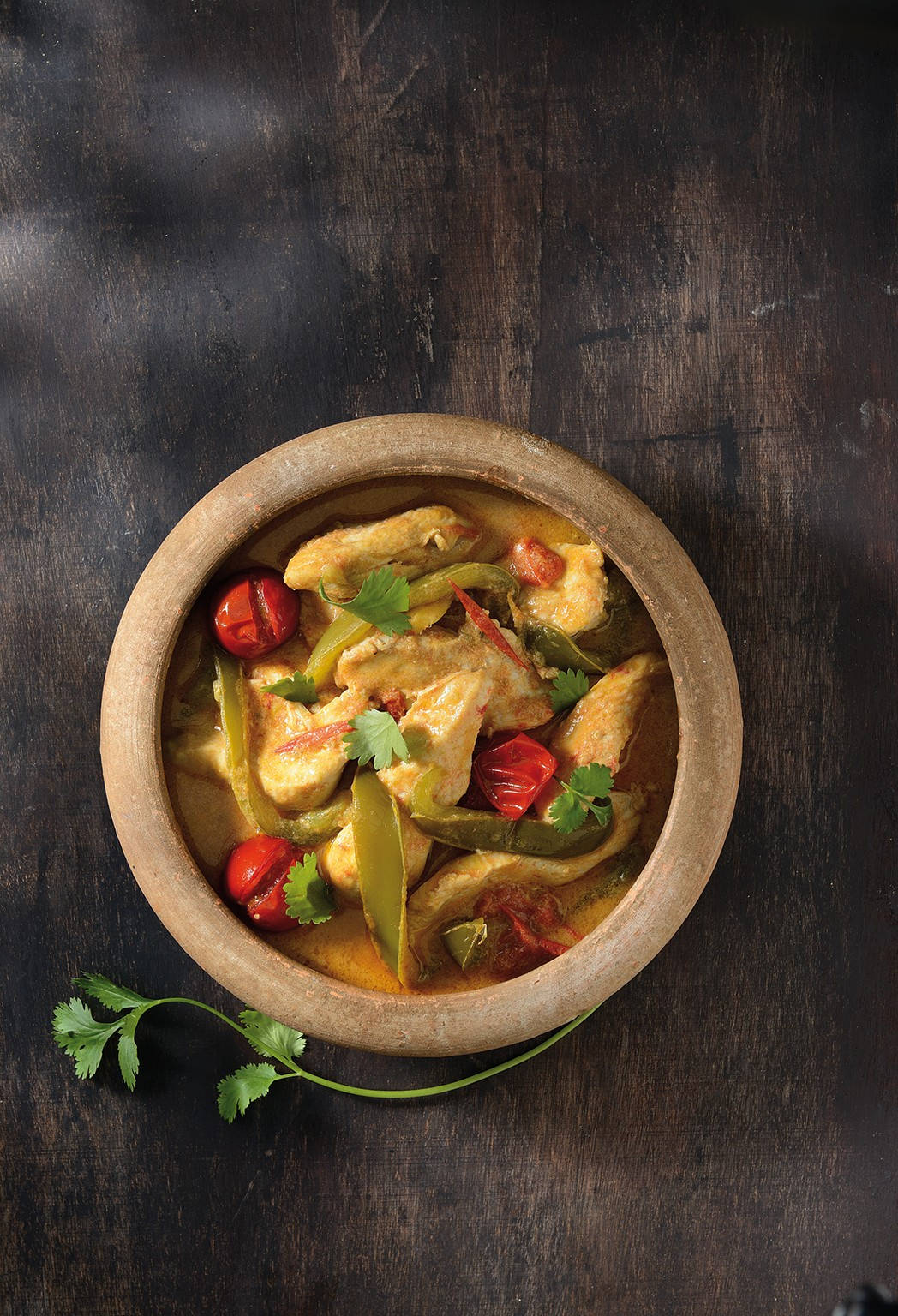 Thai Curry In Clay Pot Top Angle Shot Background