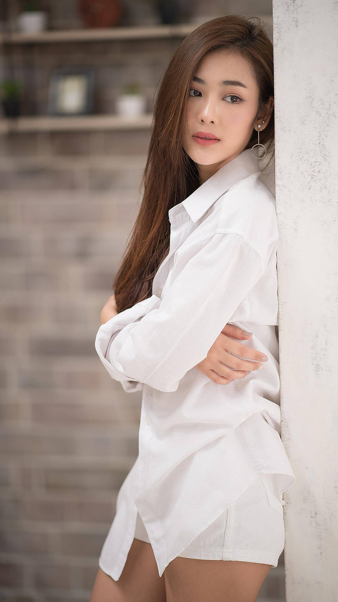 Thailand Woman Leaning On Wall