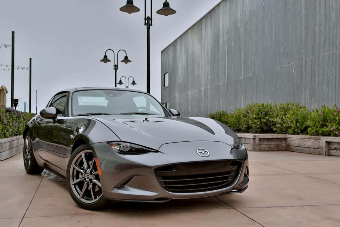 The 2018 Mazda Mx-5 Parked On The Side Of The Street