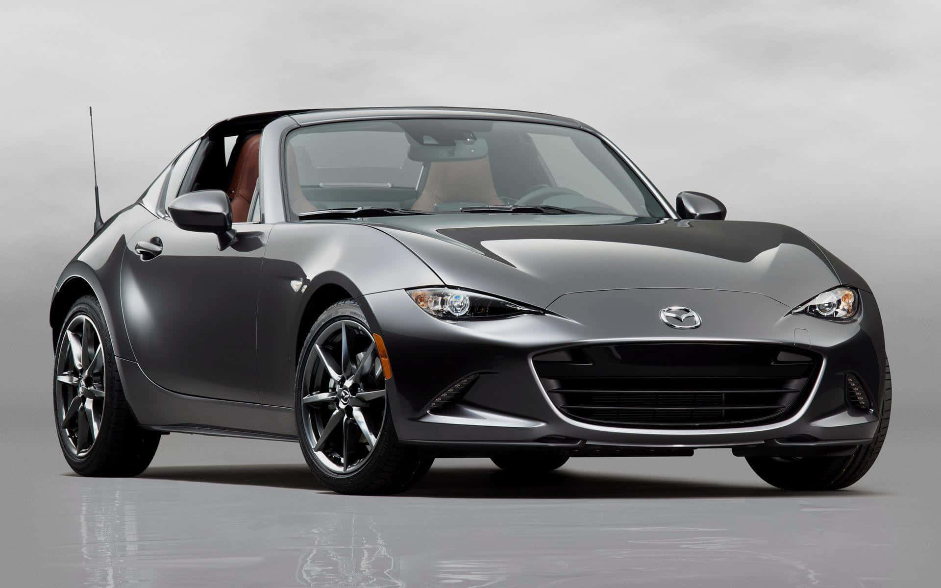 The 2018 Mazda Mx-5 Roadster Is Shown In Gray