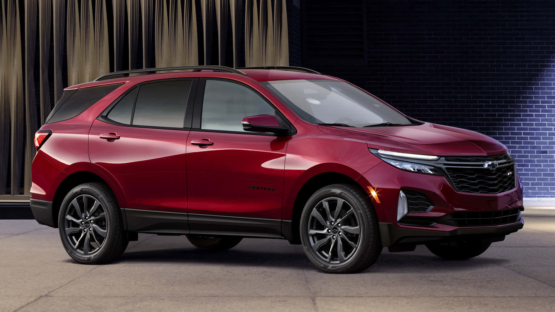 The 2019 Chevrolet Equinox Is Shown In Red Background