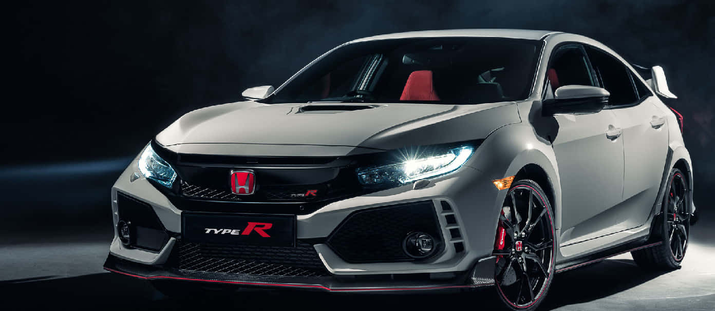 The 2019 Honda Civic Type R Is Shown In A Dark Room