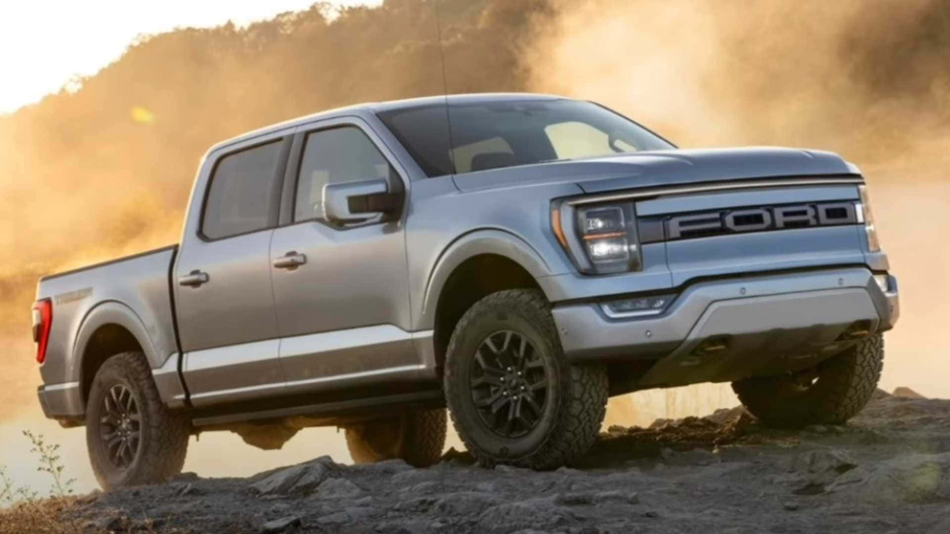 The 2020 Ford F - 150 Is Driving On A Rocky Road Background