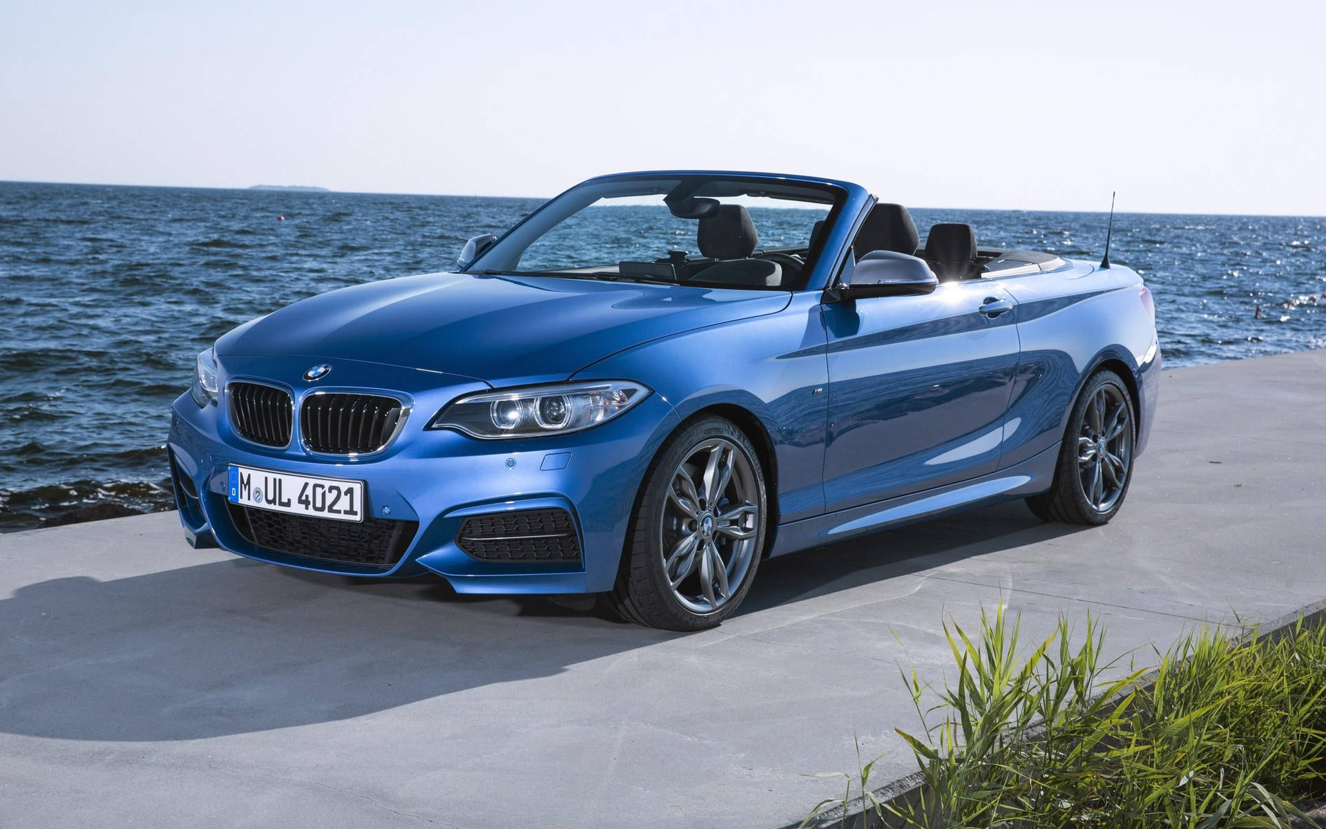 The 2023 Bmw M4 Luxury Sports Car Showcasing Its Sleek Design And Muscular Stance.