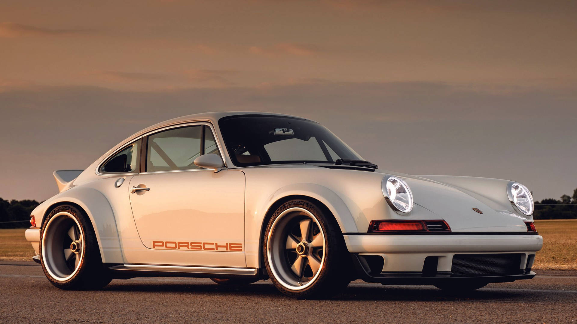 The Aesthetic Elegance Of Singer Porsche 911 Background