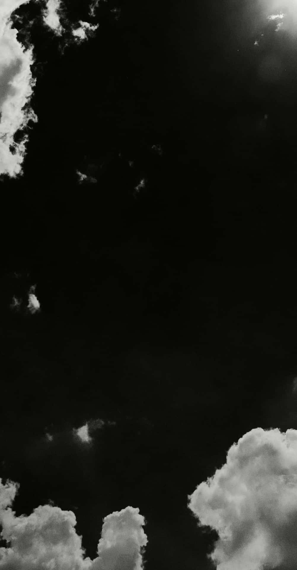 The Artful Beauty Of Black And White Clouds Background