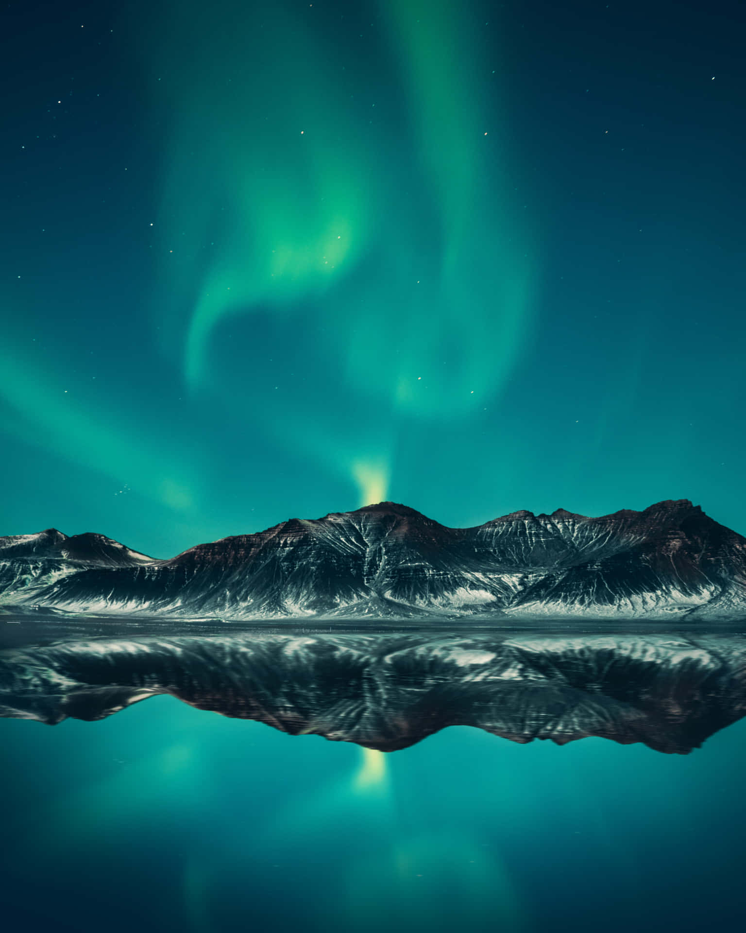 The Aurora Borealis Is Reflected In The Water Background