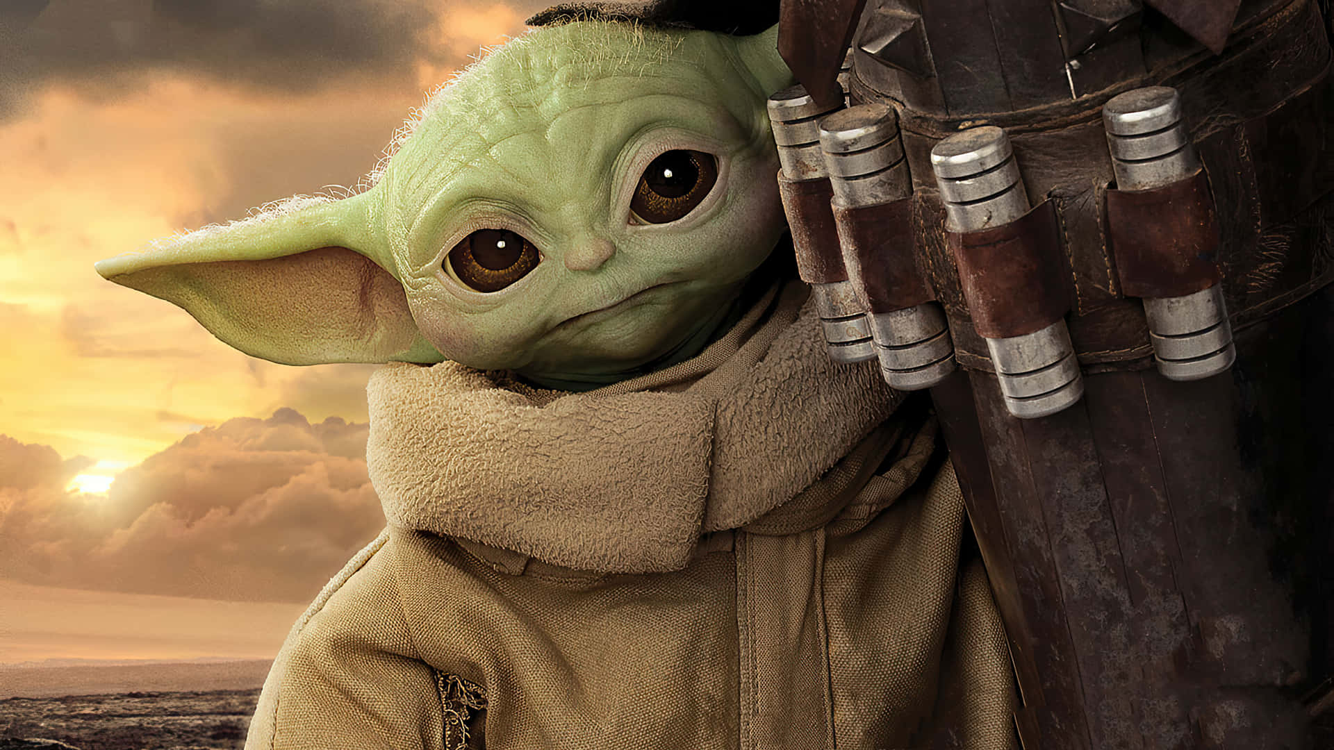 The Baby Yoda Is Holding A Gun Background