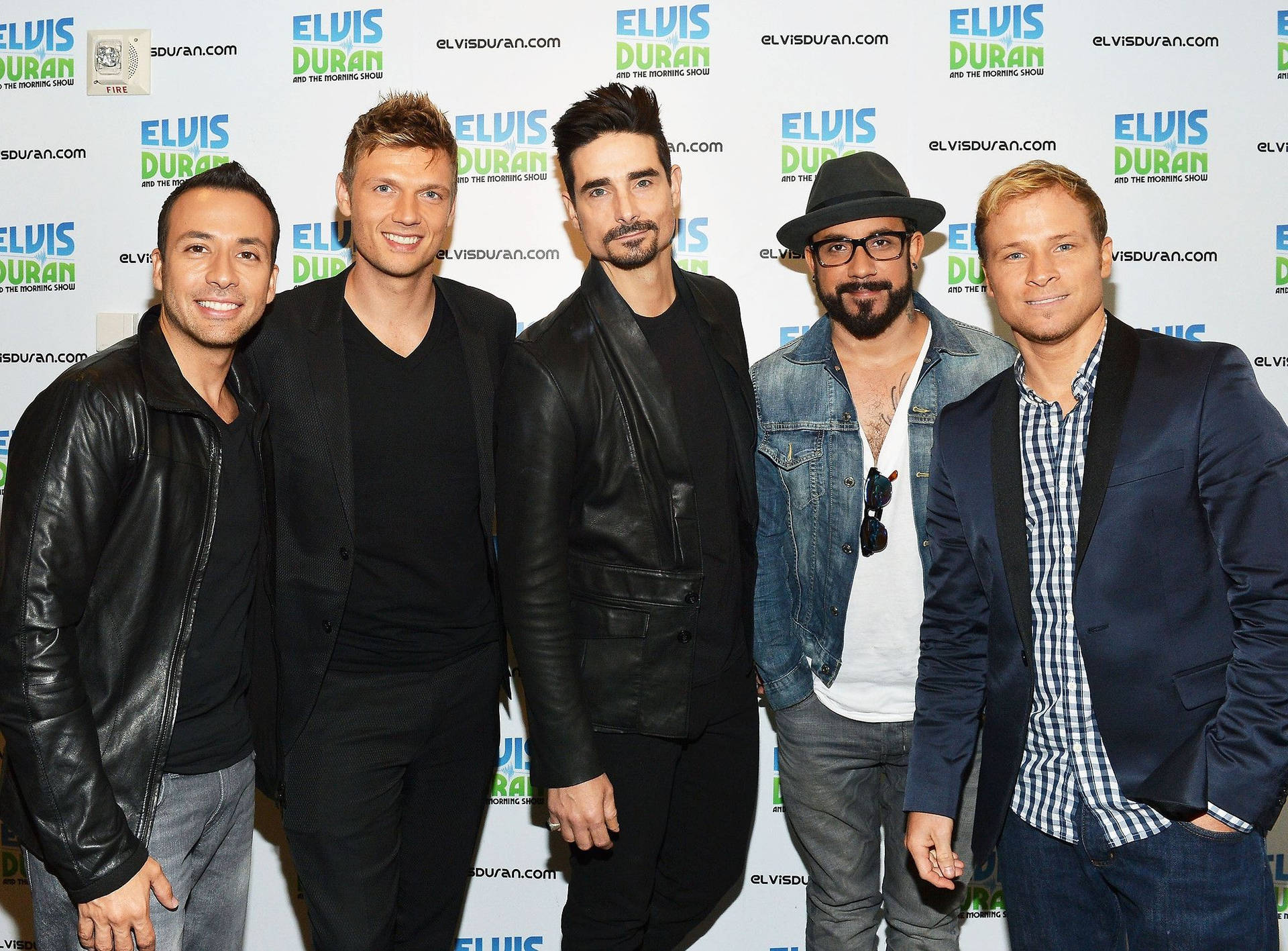 The Backstreet Boys Striking A Pose On The Red Carpet. Background