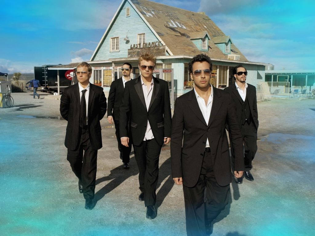The Backstreet Boys Suited Up In Formal Wear Background