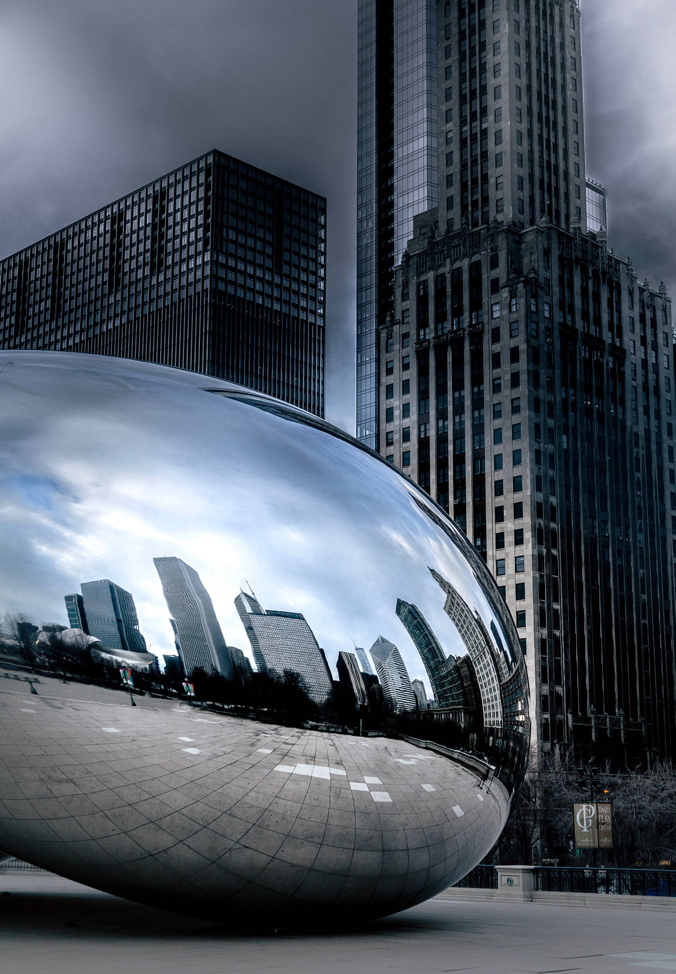 The Bean In Chicago Reflecting Surrounding Buildings.