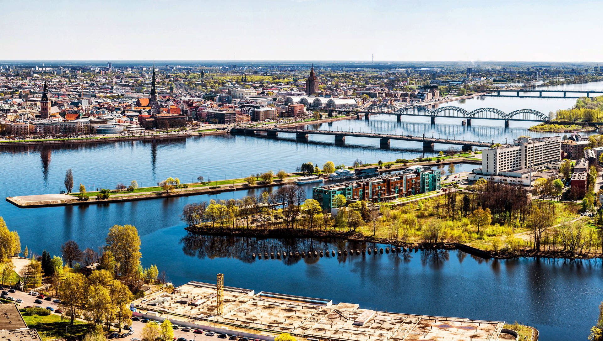 The Beautiful Daugava River In Riga Background