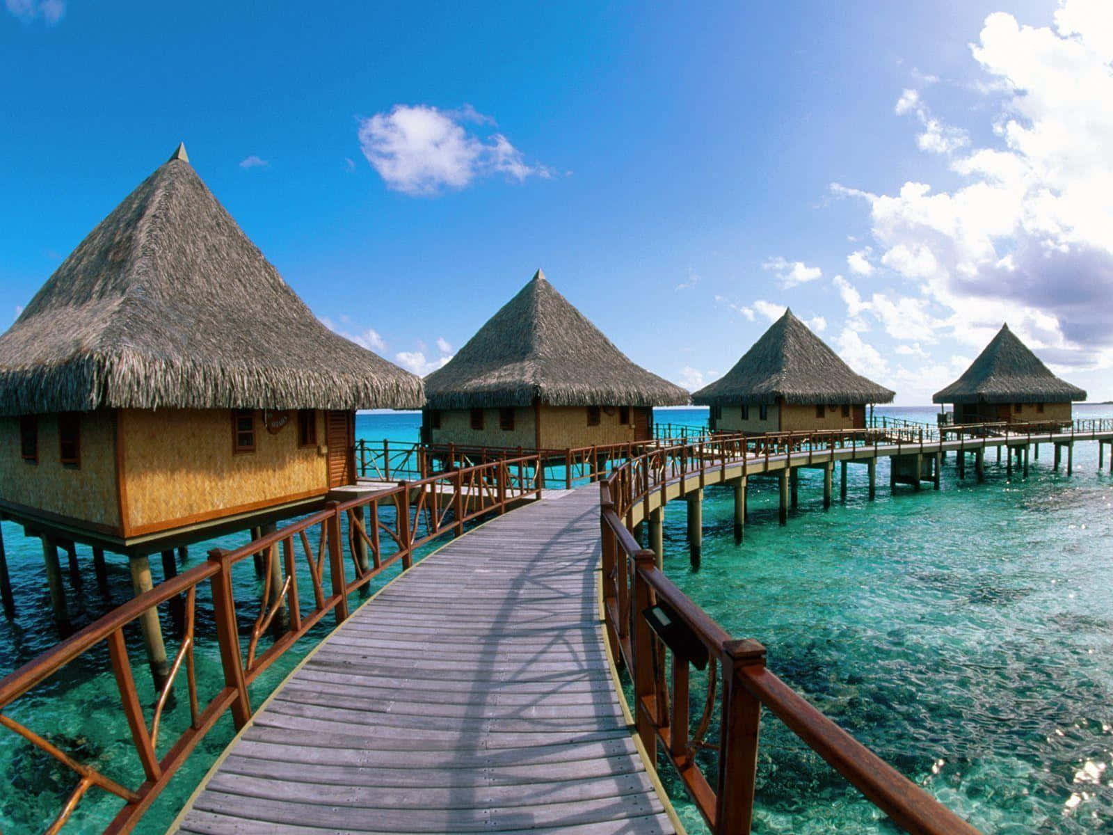 The Beautiful Waters Of Bora Bora Background