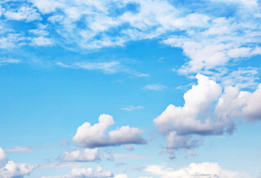 The Beauty Of A Sky Filled With Blue Background