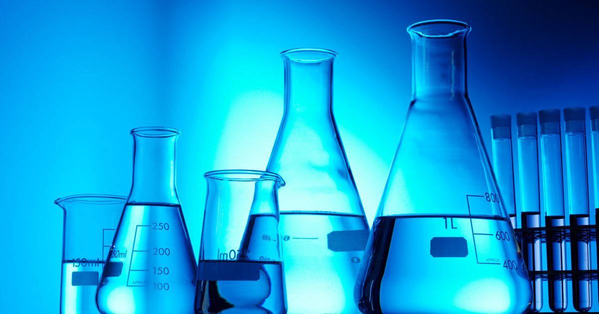 The Beauty Of Chemistry - Minimalist Blue-themed Laboratory Scene. Background