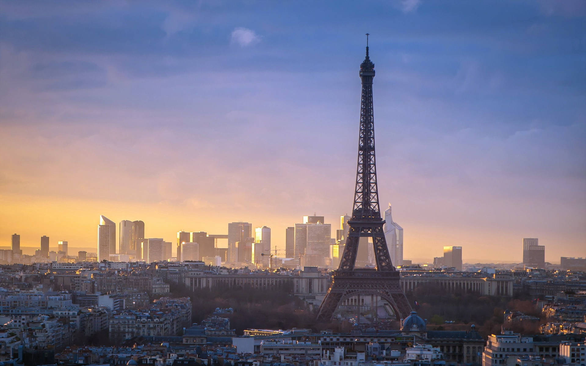 The Beauty Of Paris: A Romantic Sunset View Of The Eiffel Tower Background