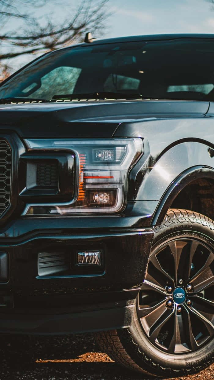 The Black 2019 Ford F - 150 Parked On A Dirt Road