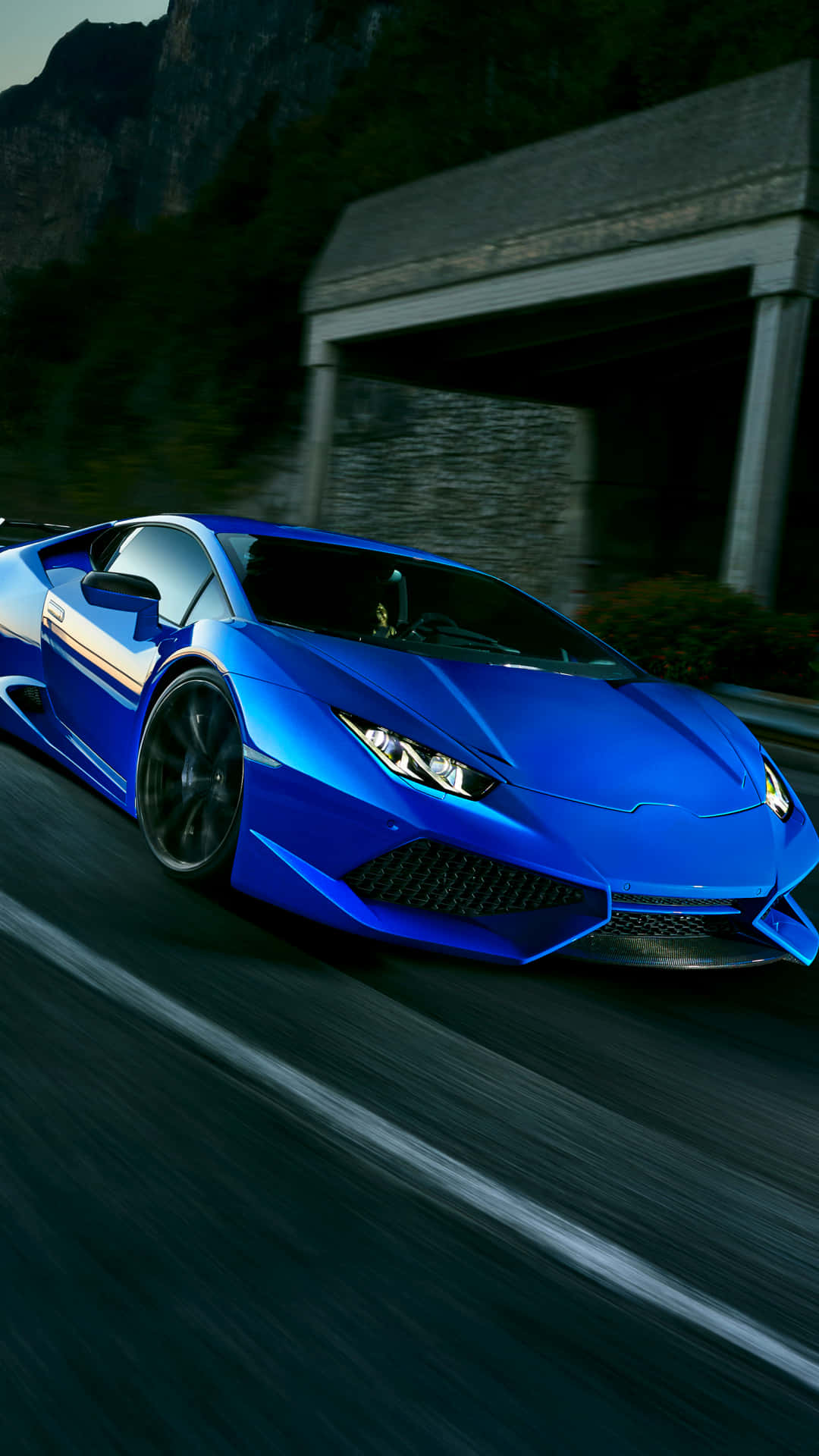 The Blue Lamborghini Drive Giving The Thrill Of Luxury Background