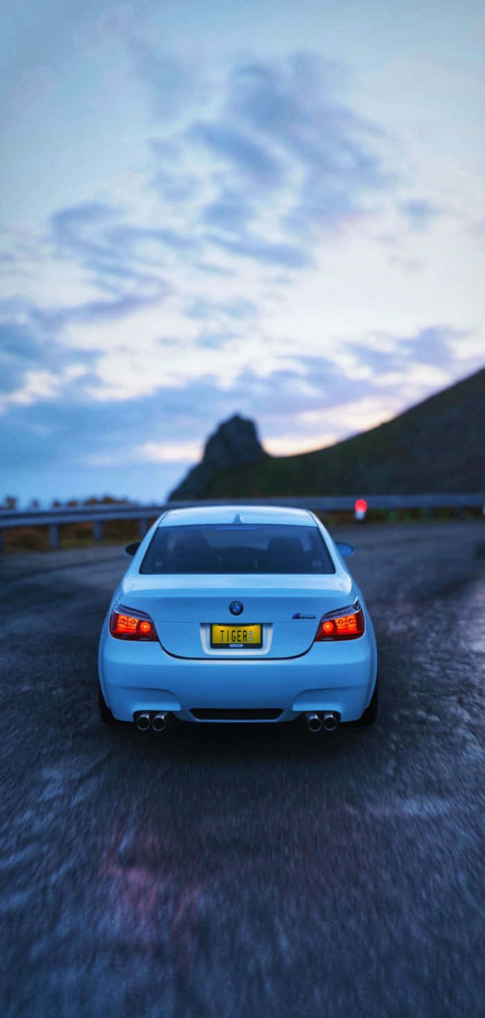 The Bmw M Iphone: Luxury And Speed In Your Pocket Background