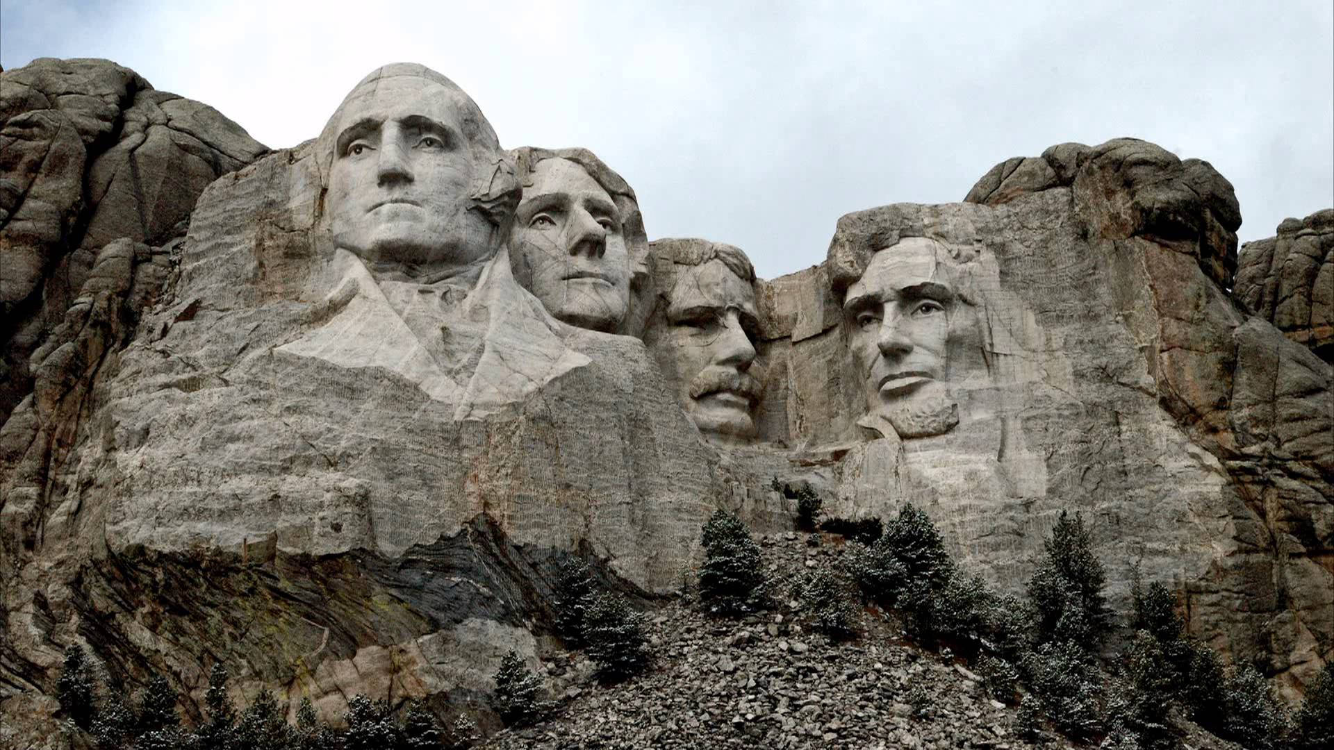 The Borglums Materpiec In Mount Rushmore Background