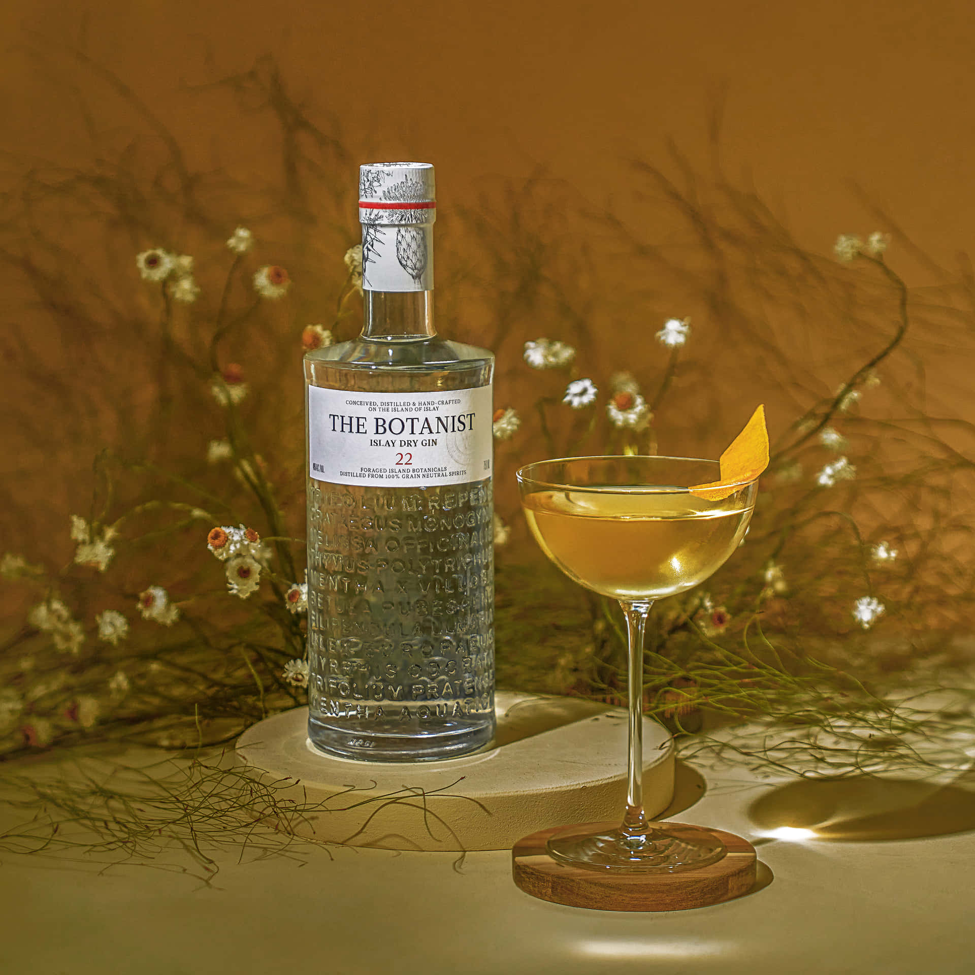 The Botanist Islay Dry Gin Cocktail And Flowers Background