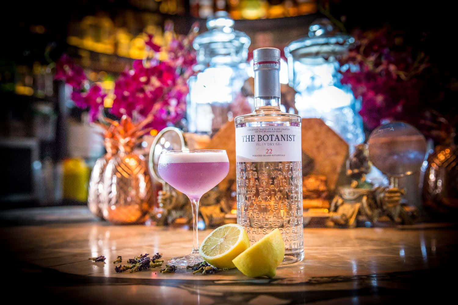 The Botanist Islay Dry Gin Drink Purple Cocktail And Lemon Background