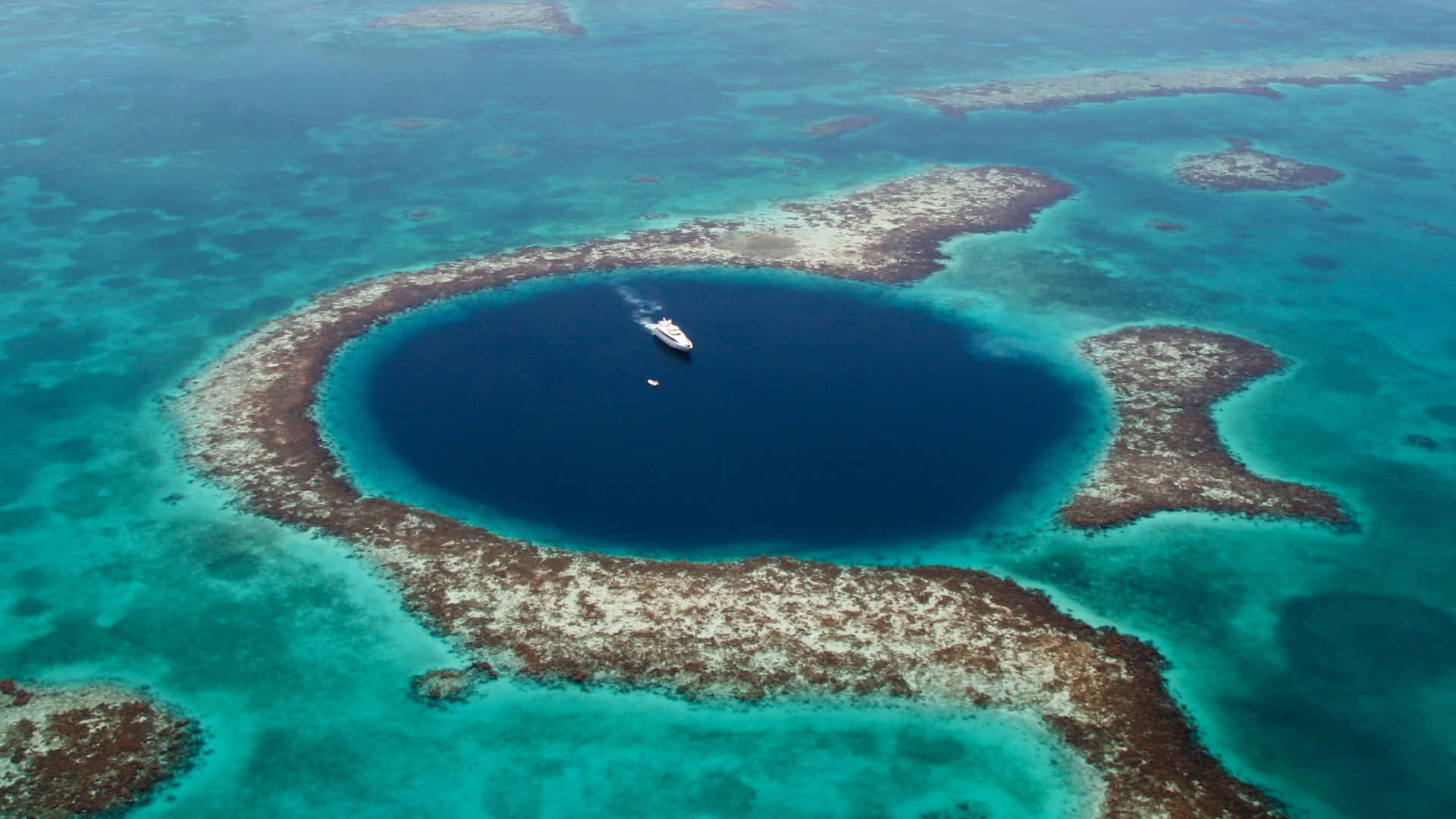 The Breath-taking Great Blue Hole Near Belize Background