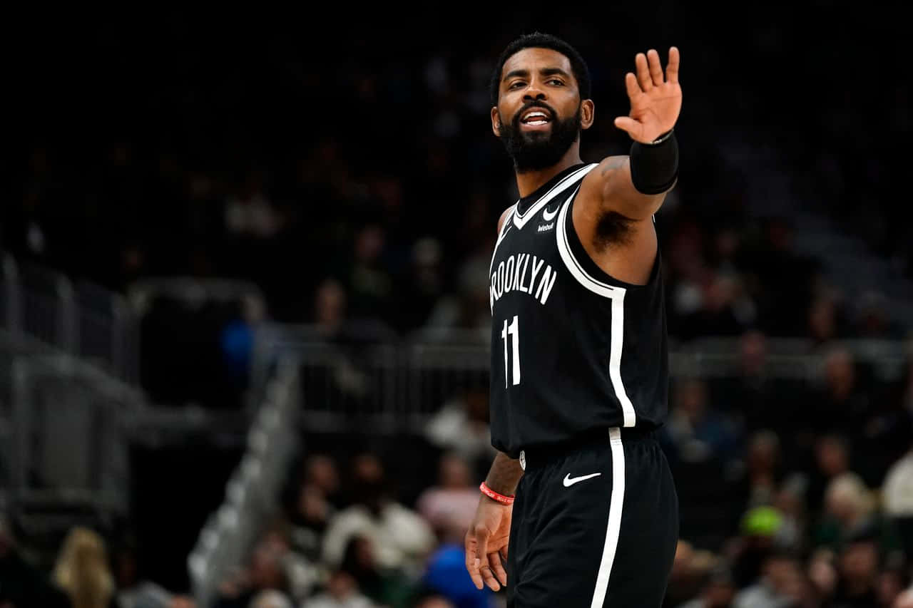 The Brooklyn Nets’ Kyrie Irving, Ready For Action Background