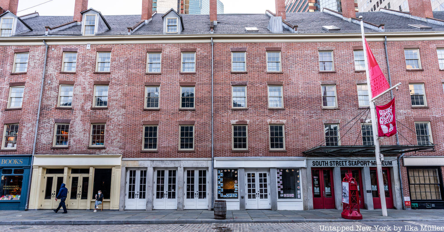 The Bustling Atmosphere Of South Street Seaport Background