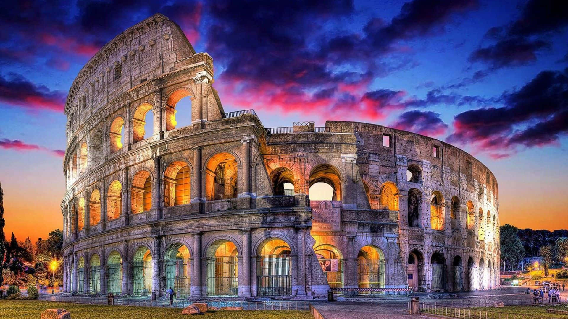 The Colossion In Rome At Sunset Background