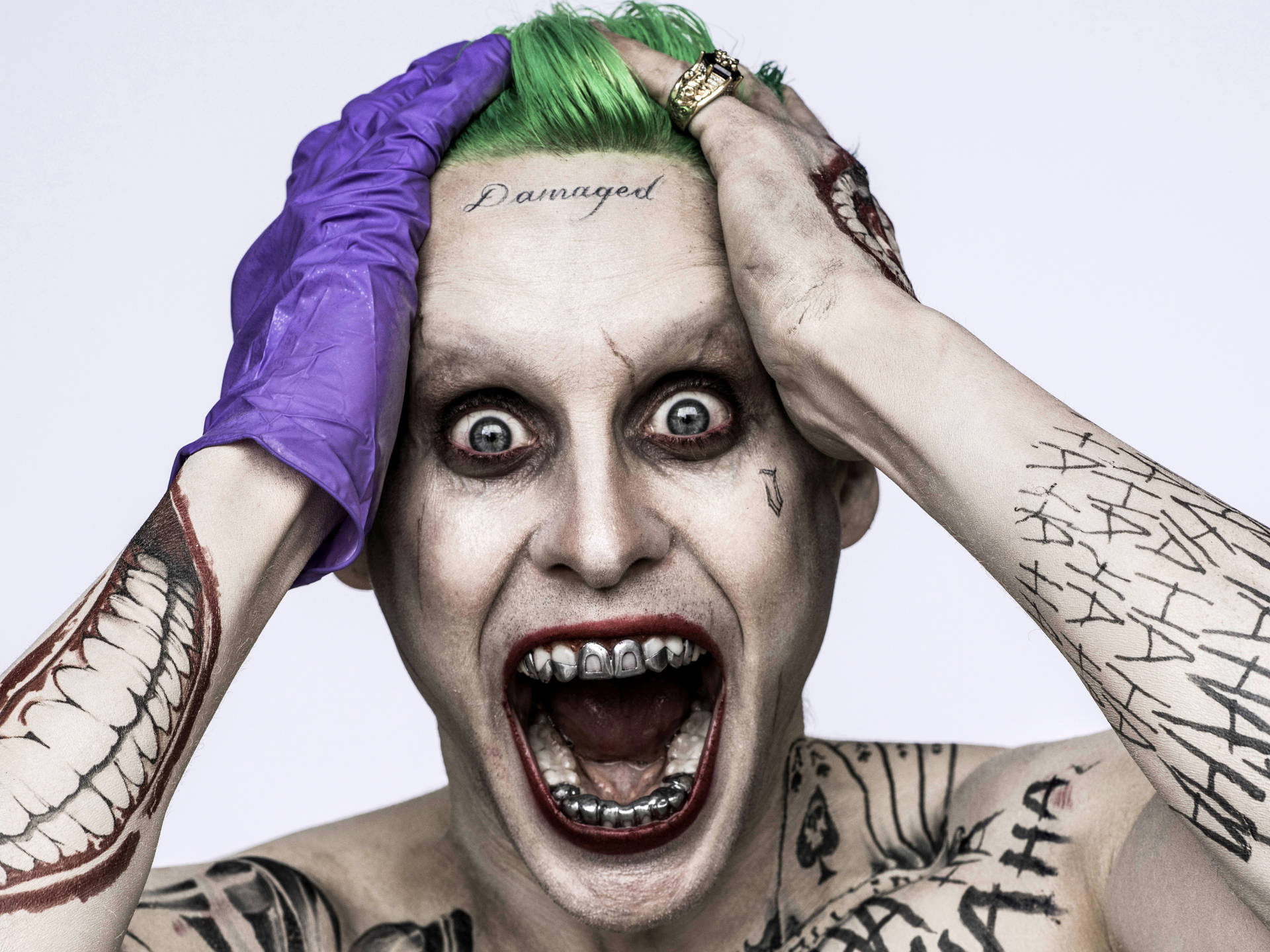 The Crazed Joker In The Suicide Squad Background