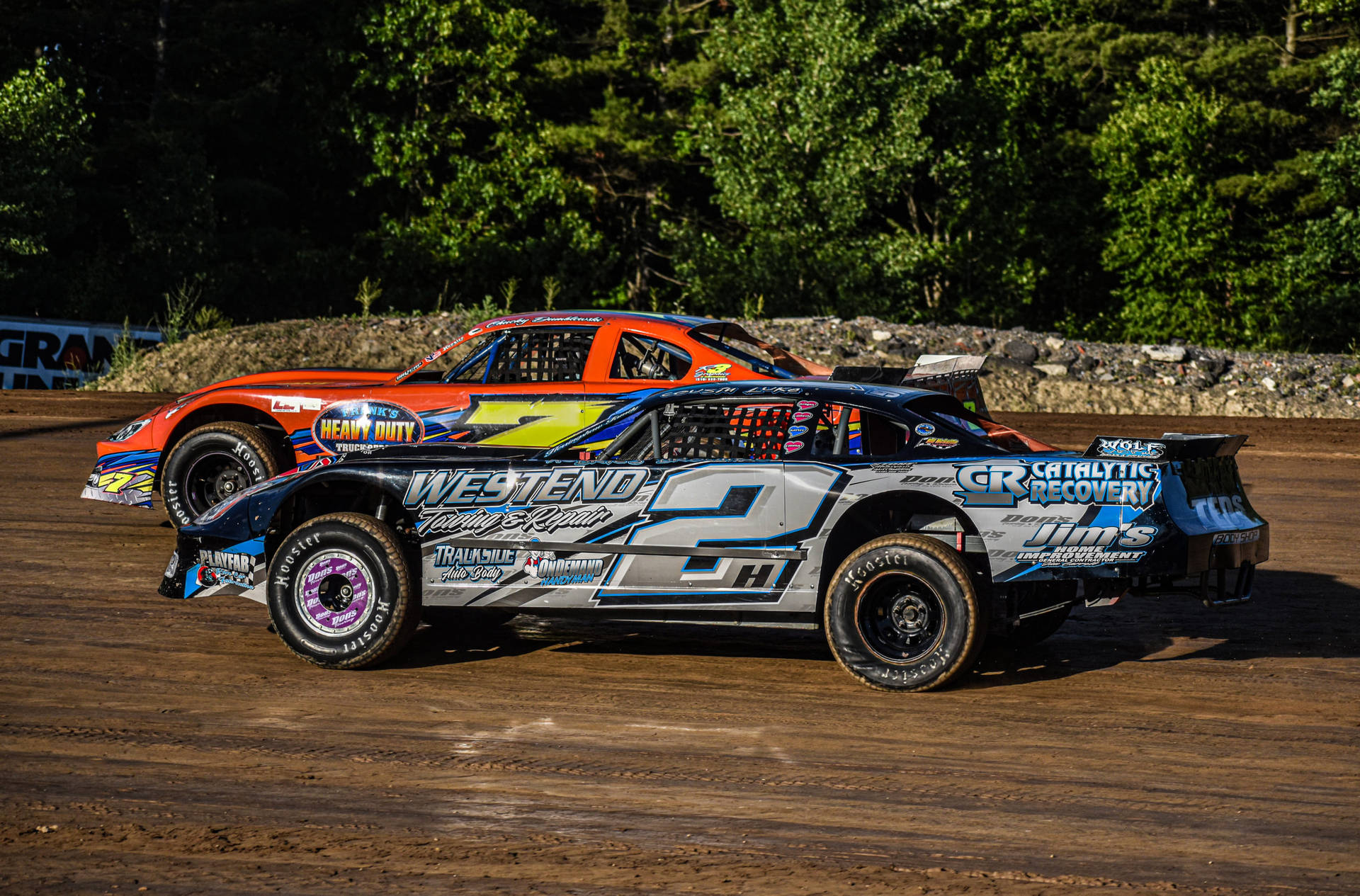 The Dirt Car – A Race Loudly Roaring Into The Future Background