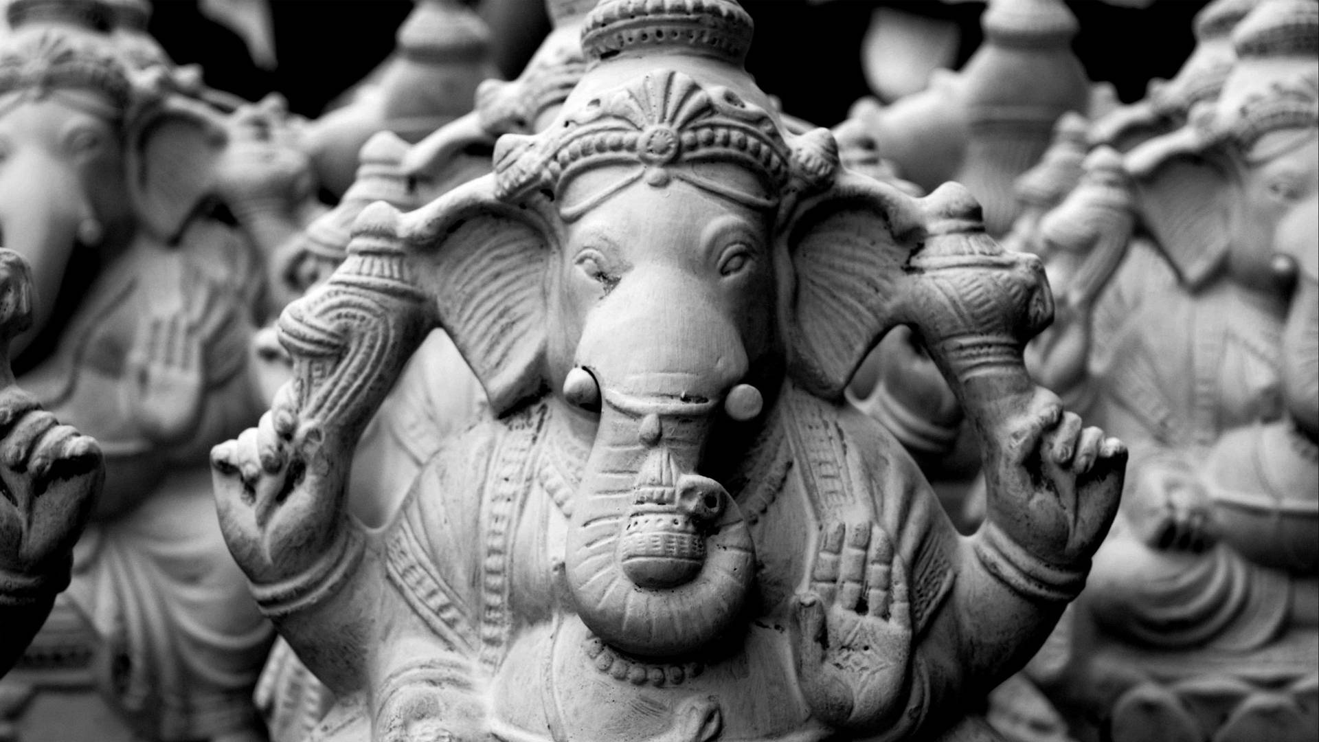 The Divine Artistry Captured: Black And White Clay Ganesh Background