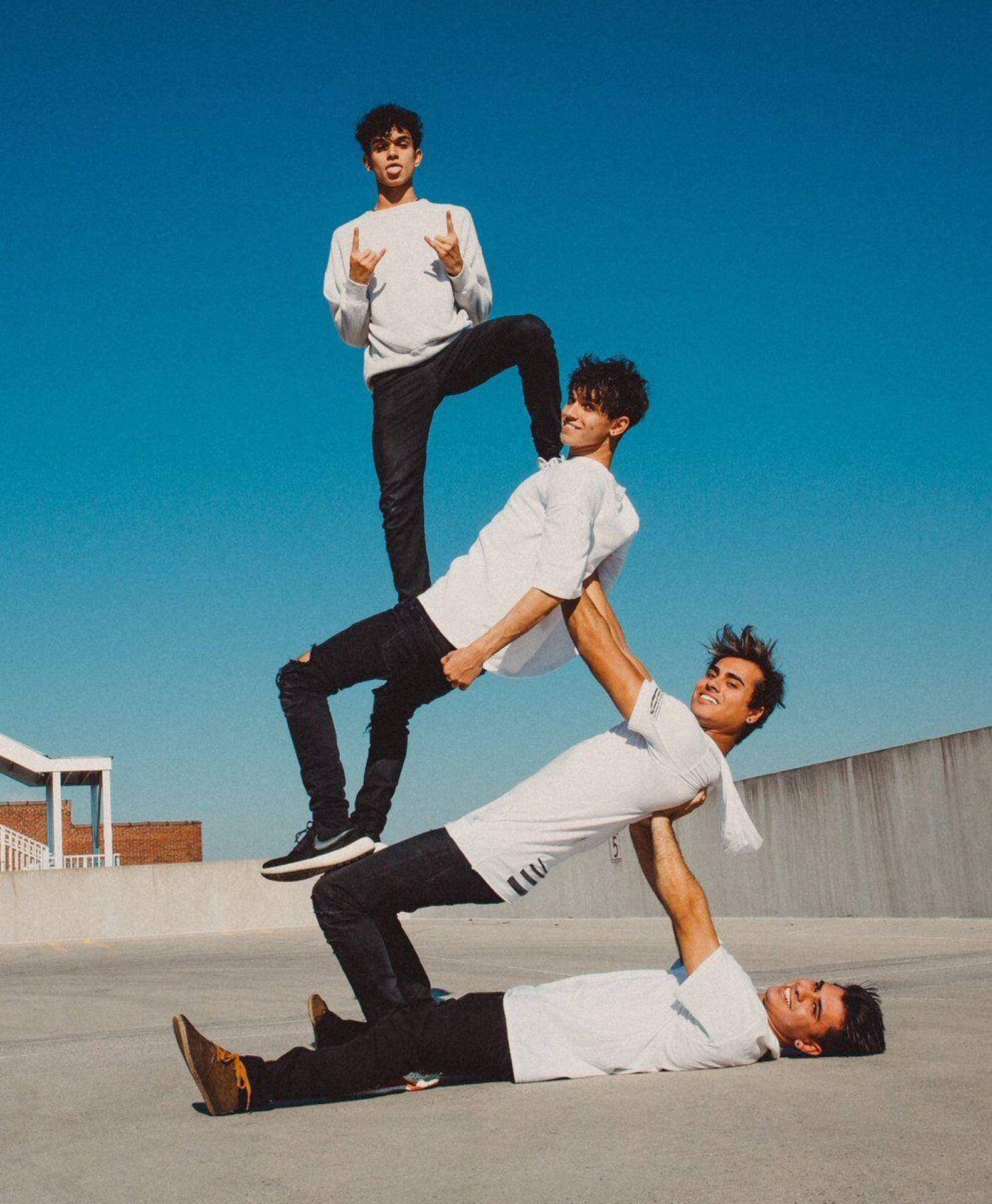 The Dobre Brothers Posing In Stylish White Tees