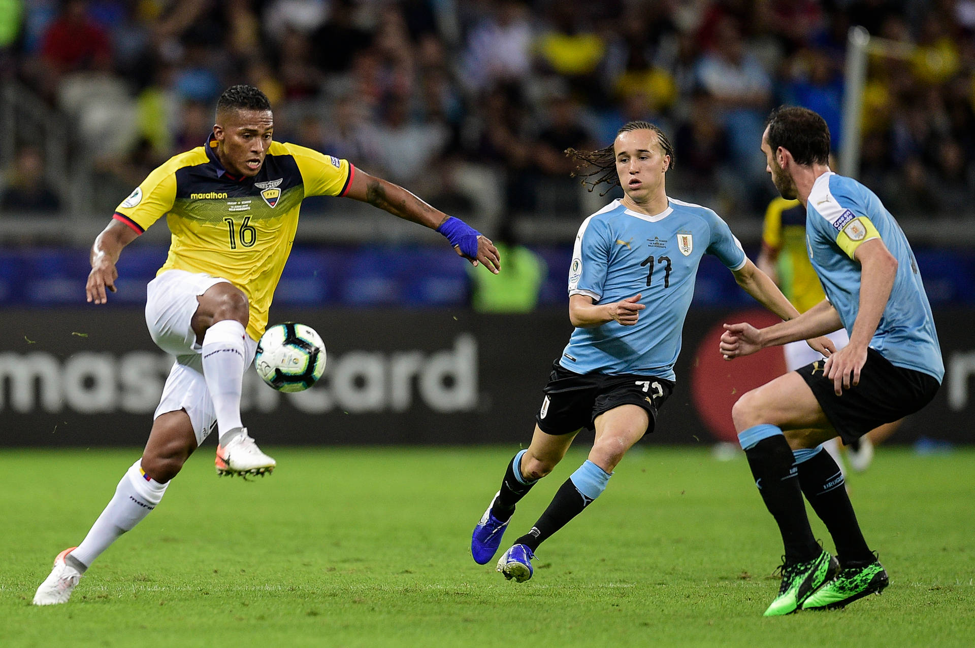 The Ecuador National Football Team In Action Against Argentina Background