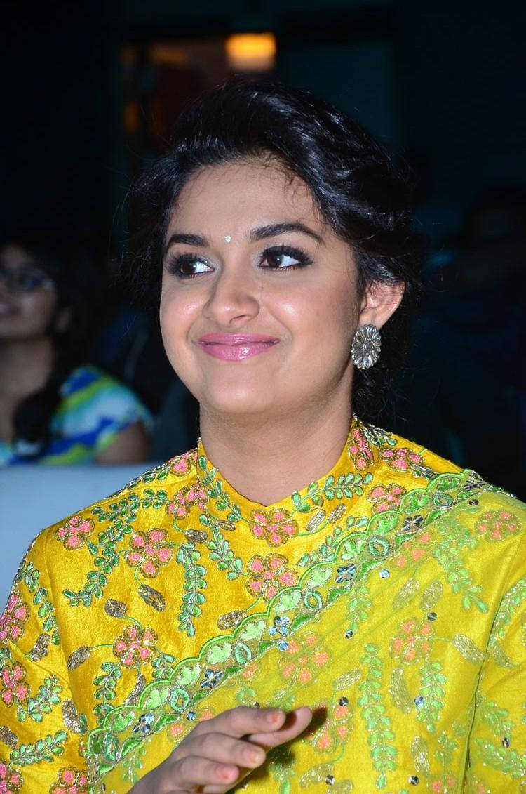 The Elegant Keerthi Suresh Dazzling In A Yellow Dress. Background