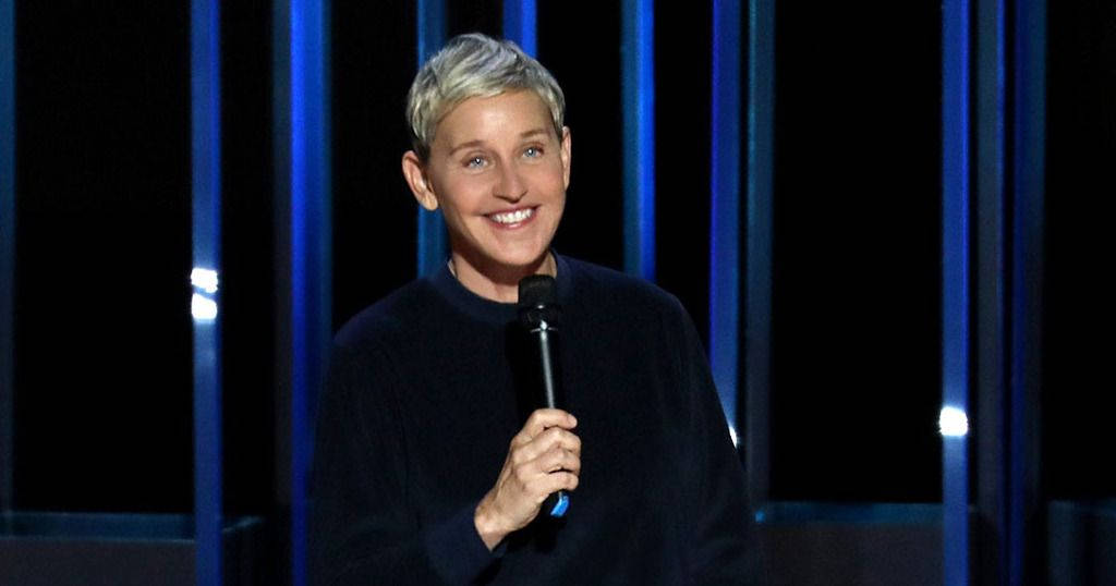 The Ellen Show Host Holding Mic Background