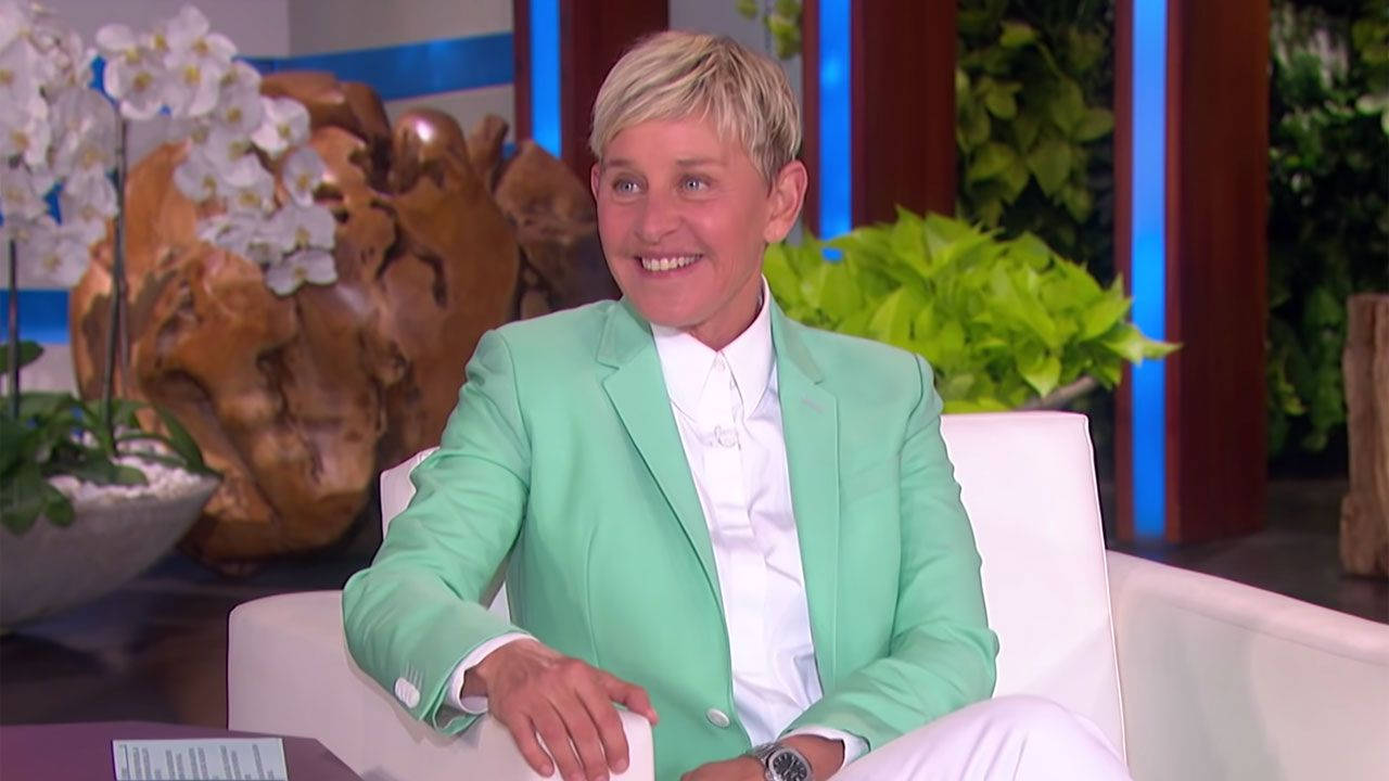 The Ellen Show Host In Green Suit Background