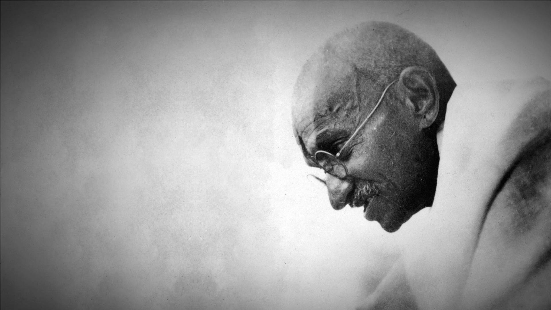 The Enlightened Peacemaker - Mahatma Gandhi Background