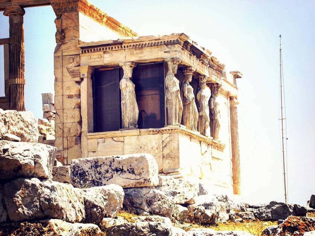 The Erechtheion's Maiden Porch Viewed From Its East Background