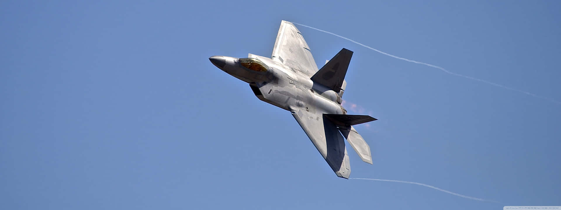 The F-22 Raptor, America's Premier Fighter Jet Background