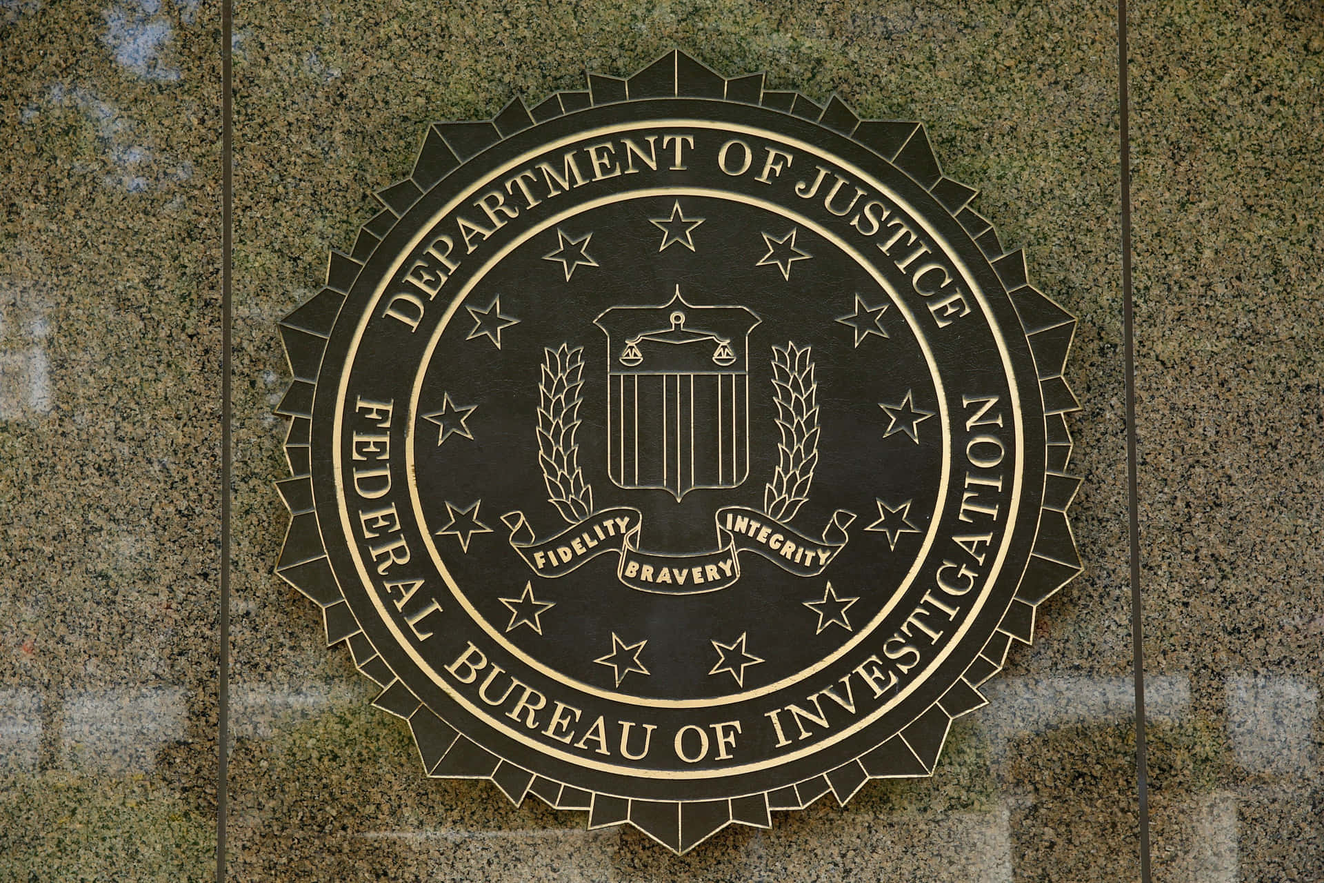 The Fbi Logo Is On The Wall Of A Building Background
