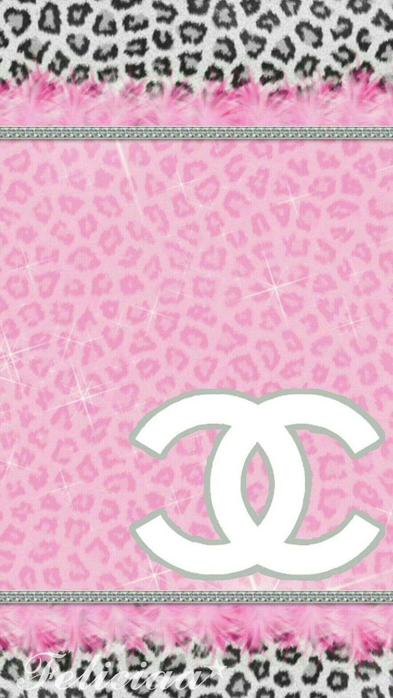 The Feminine And Elegant Pink Chanel Logo Background