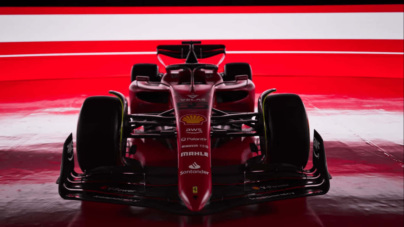 The Ferrari F1 Team Showcases Its Dominance On The Track Background