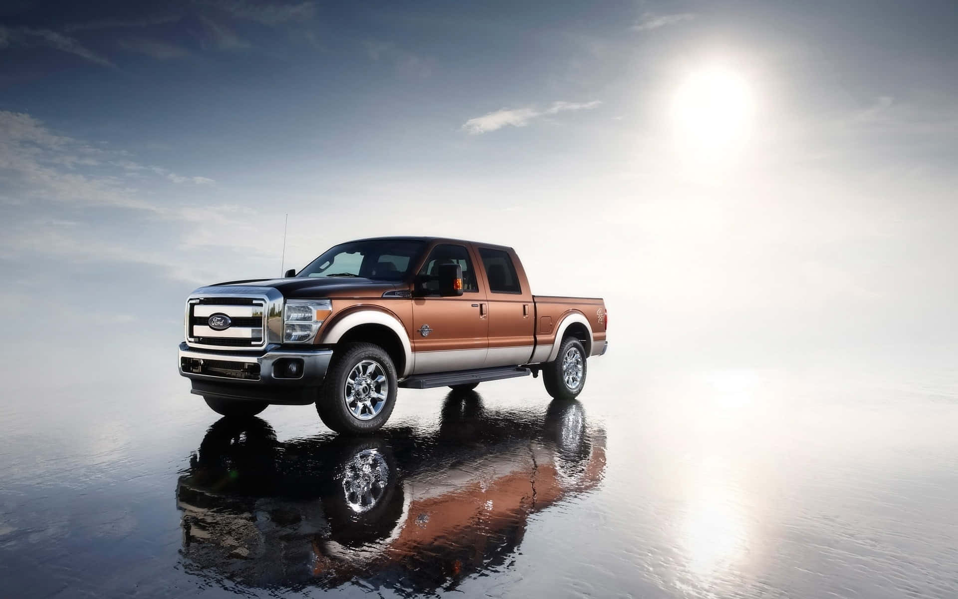 The Ford Super Duty F-250 Is Parked On A Rocky Surface Background