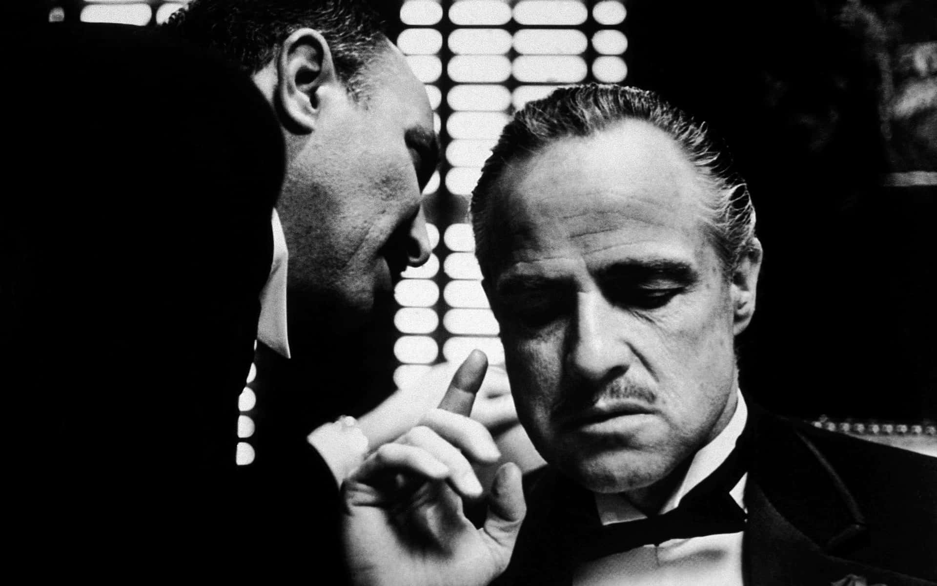 The Godfather - A Black And White Photo Of Two Men Background
