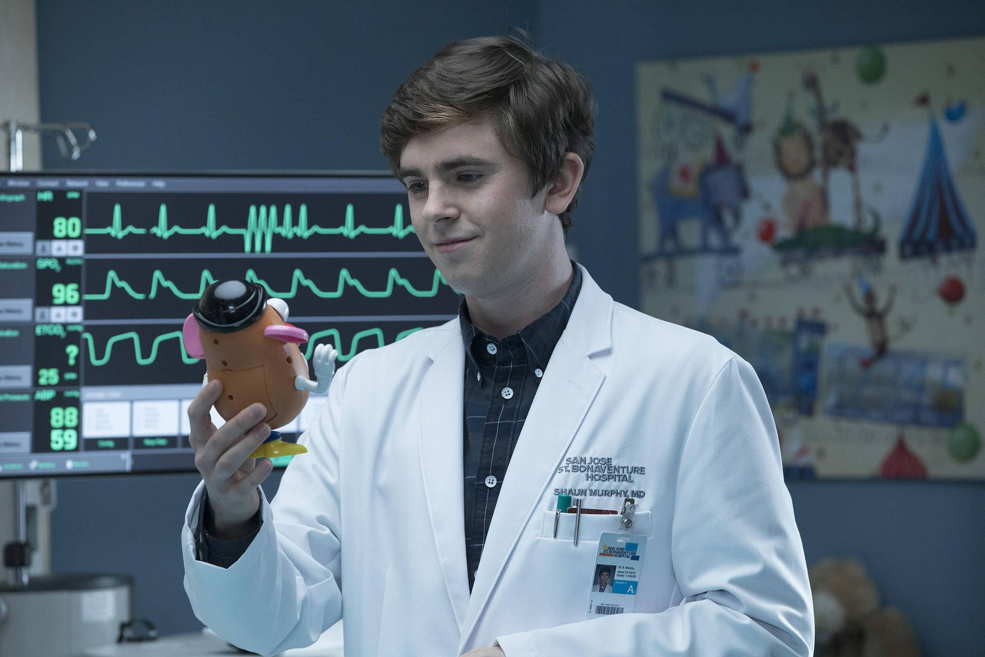 The Good Doctor Holding Potato Head Background